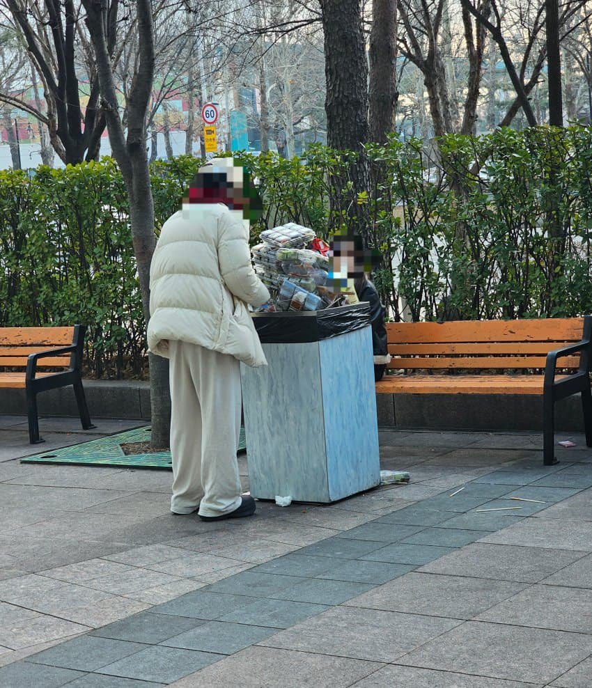Trash filled with gift bags