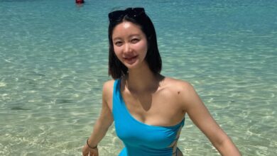 Han Groo showing her bodysuit