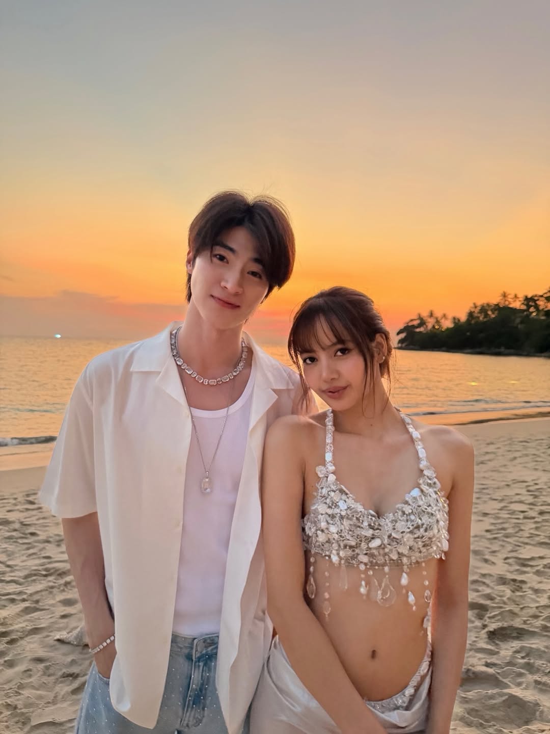 Lisa leaning on Blue Pongtiwat