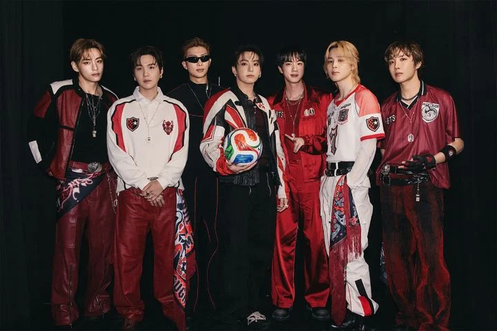 BTS members addressing cameras during a public statement