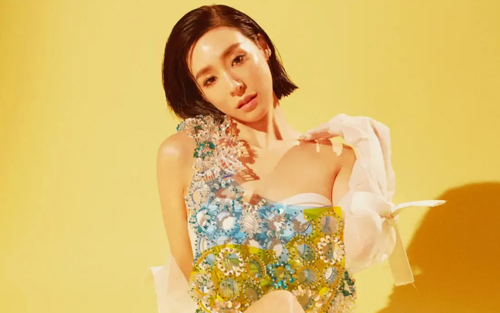Tiffany Young performing onstage in promotional solo photo