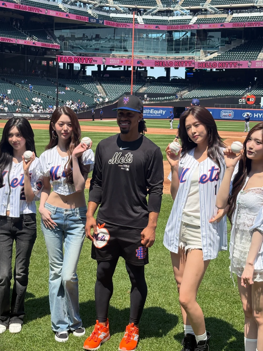 Crowd and social media reactions to Wonyoung's first pitch moment
