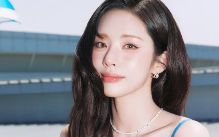 Park Ji Won posing in promotional outfit for musical debut