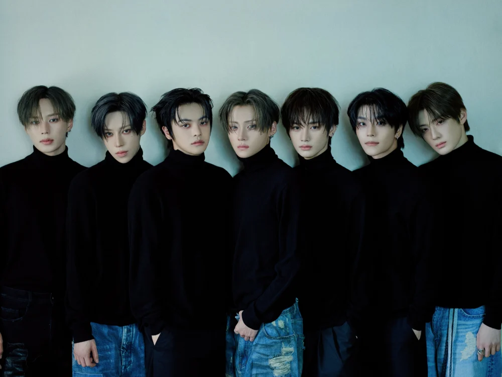 Teaser graphic announcing album release date and midnight KST timing