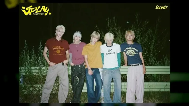 Splayit members in vintage outfits posing outdoors at night