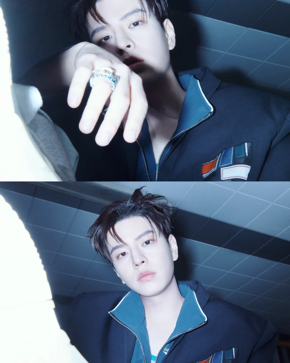 Member highlighted by a single dramatic light source