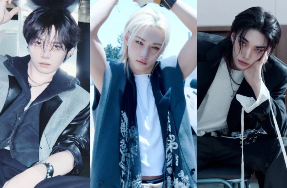 Stray Kids member posing alone in shadowy, intense lighting