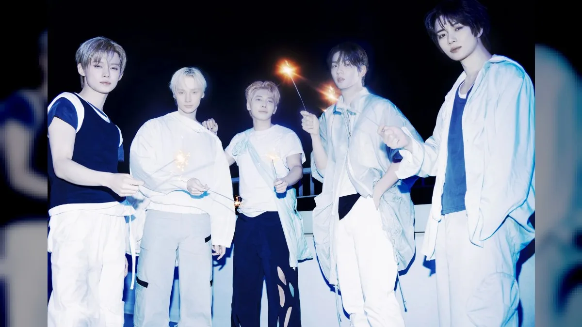 TOMORROW X TOGETHER performing with fireworks over Jingu Gaien in Tokyo